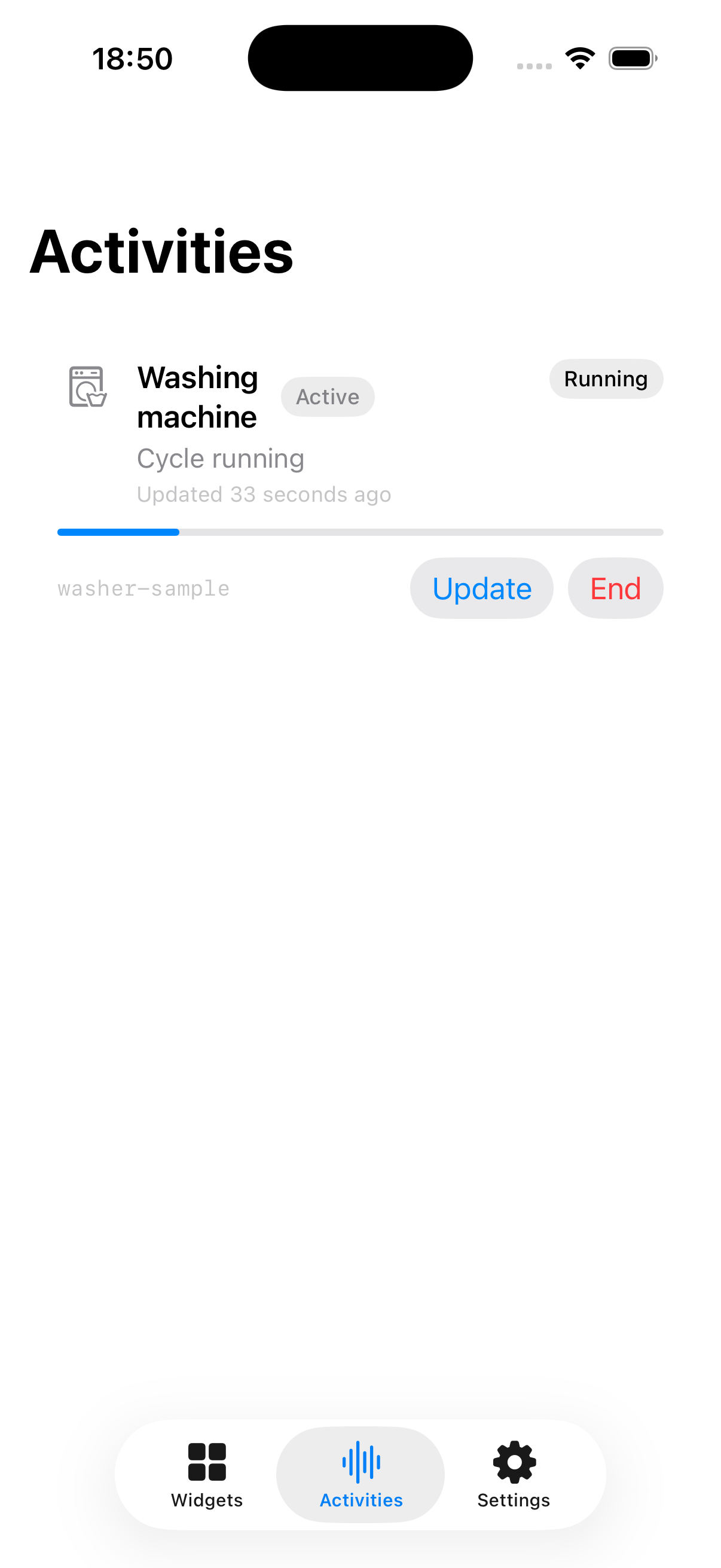 00Widget app showing a running washing machine Live Activity with update and end controls.